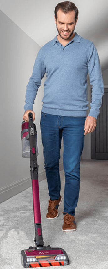Shark Vacuum Cleaner being used by a man